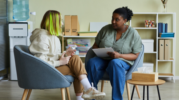 Counselor with teenage client